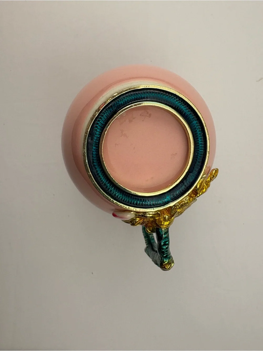 Pink ceramic enamel mug decorated with a 3D floral, rhinestones, and gold trim.